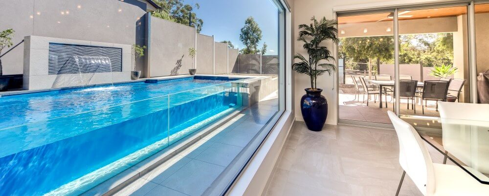 Pool design ideas pool with glass wall and a water wall water feature