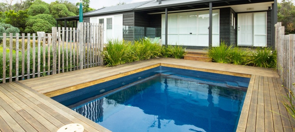 Simple small courtyard design with a plunge pool in its centre