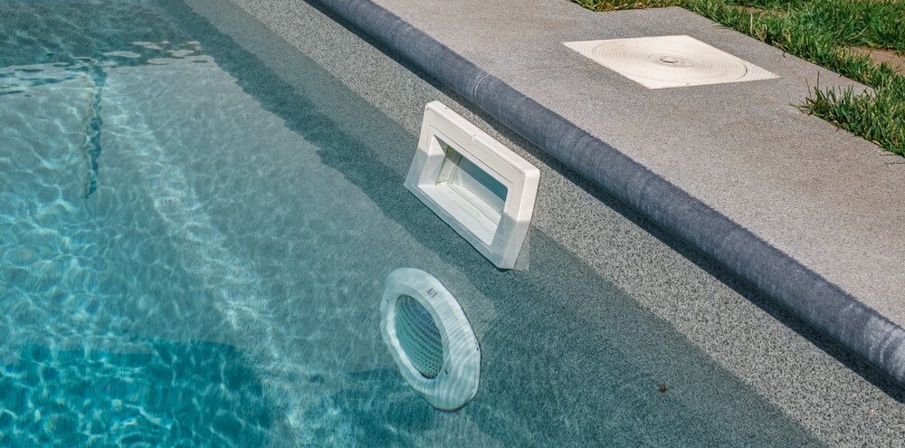 Compass Pools Australia Traditional pool circulation system eyeball and skimmer system